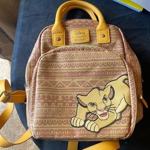 Simba loungefly backpack.